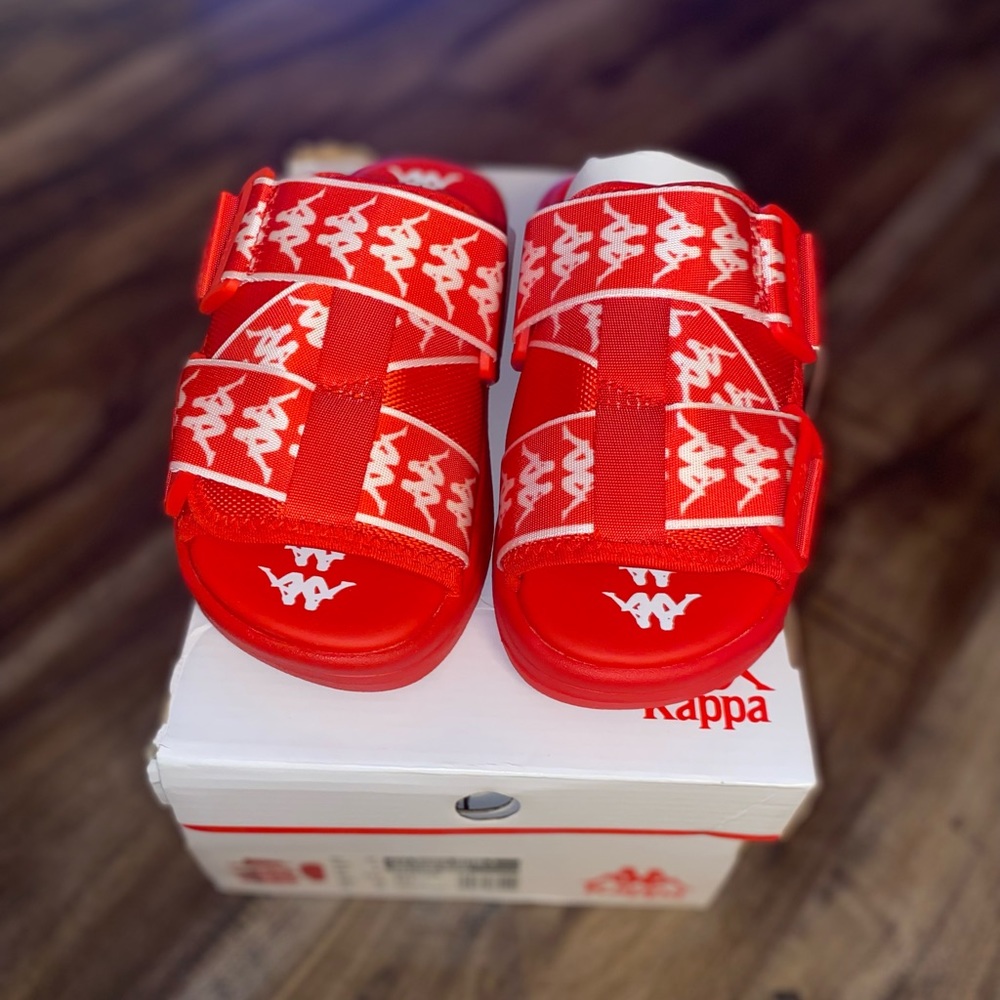 Kappa Slides. New, never worn ( got the wrong size). Box is slightly damaged.